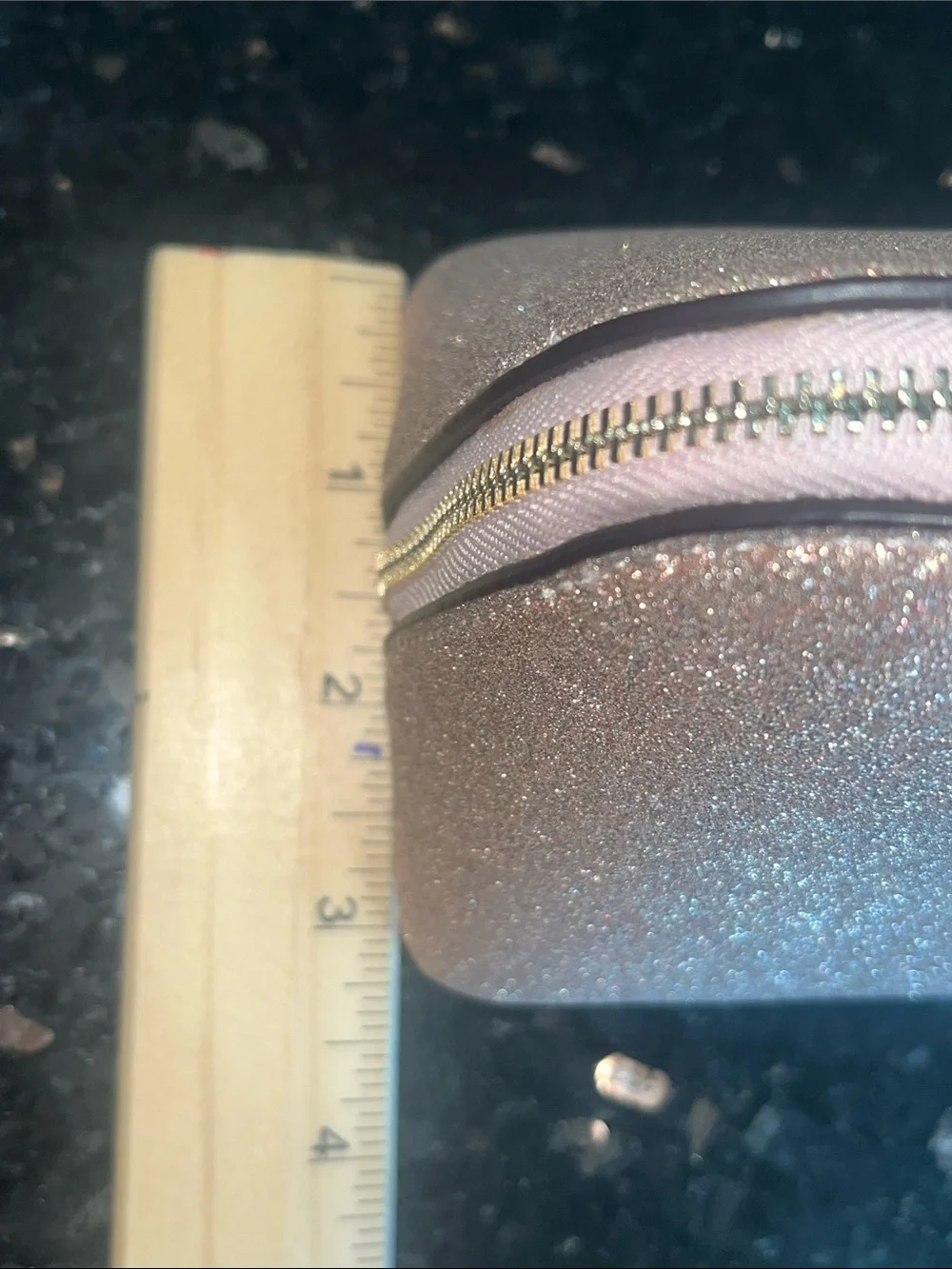 Kate Spade glittery rose gold cosmetic pouch